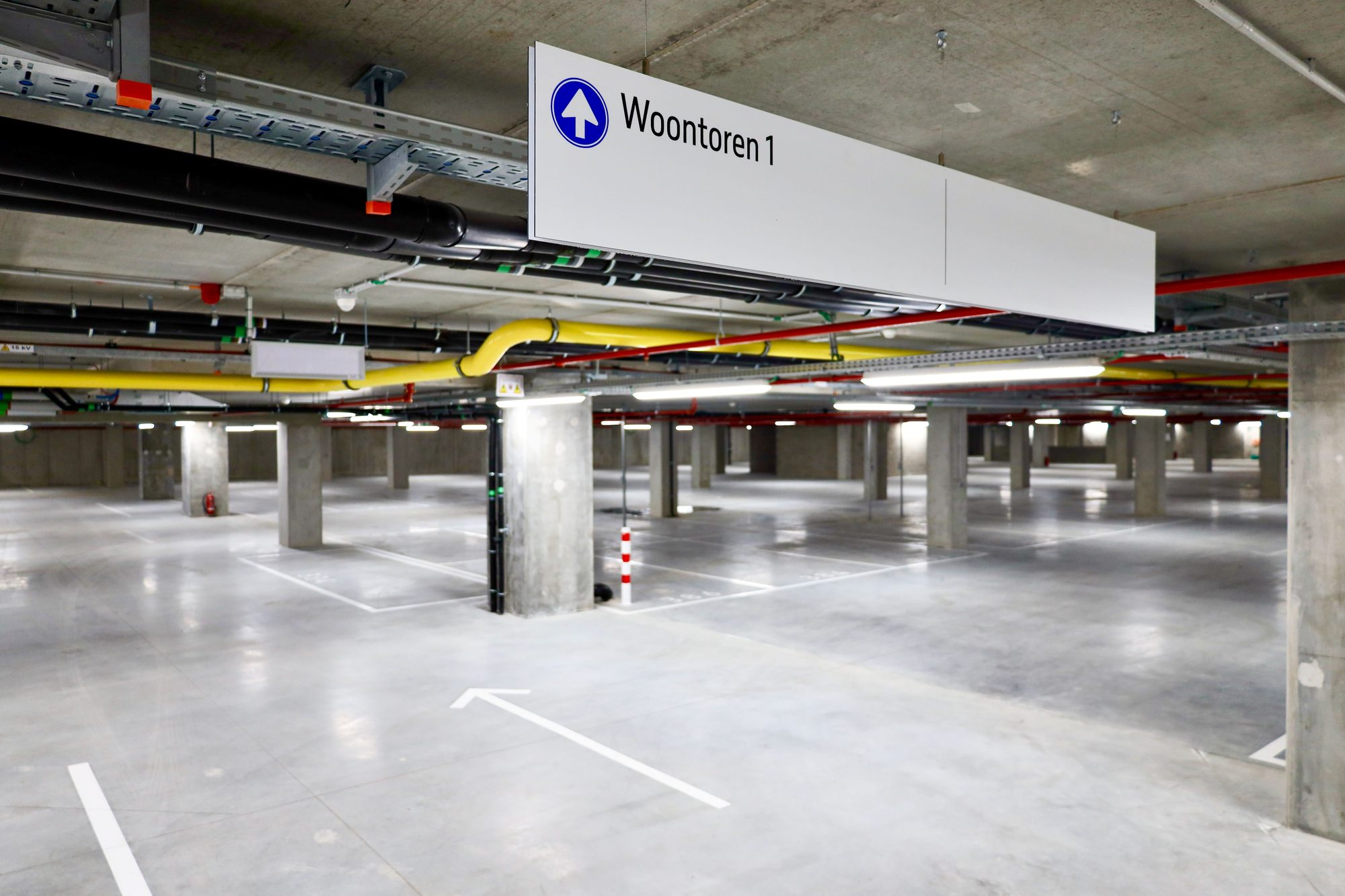 Bewegwijzering ‘Woontoren 1’ in de ondergrondse parking